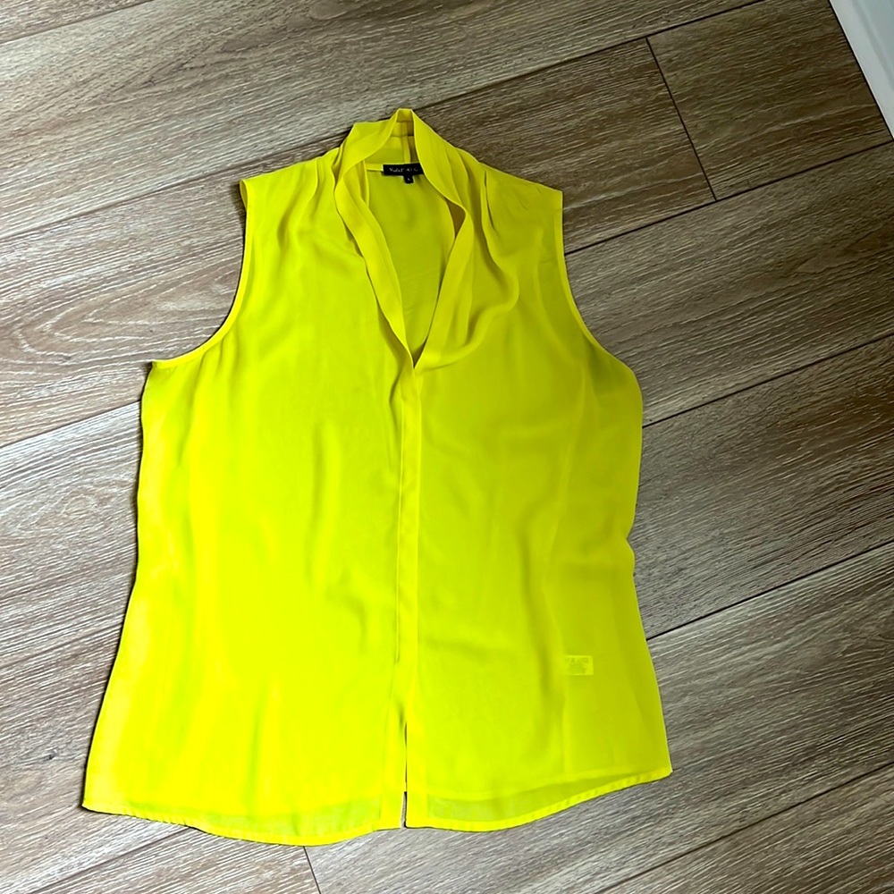 Yellow sleeveless blouse